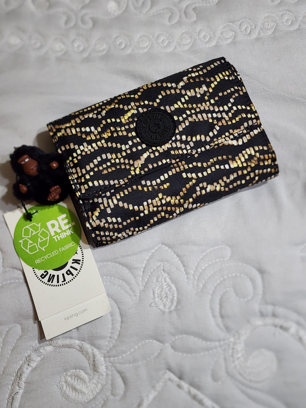 Kipling Black Wallet with Gold and Cream Pixel Print